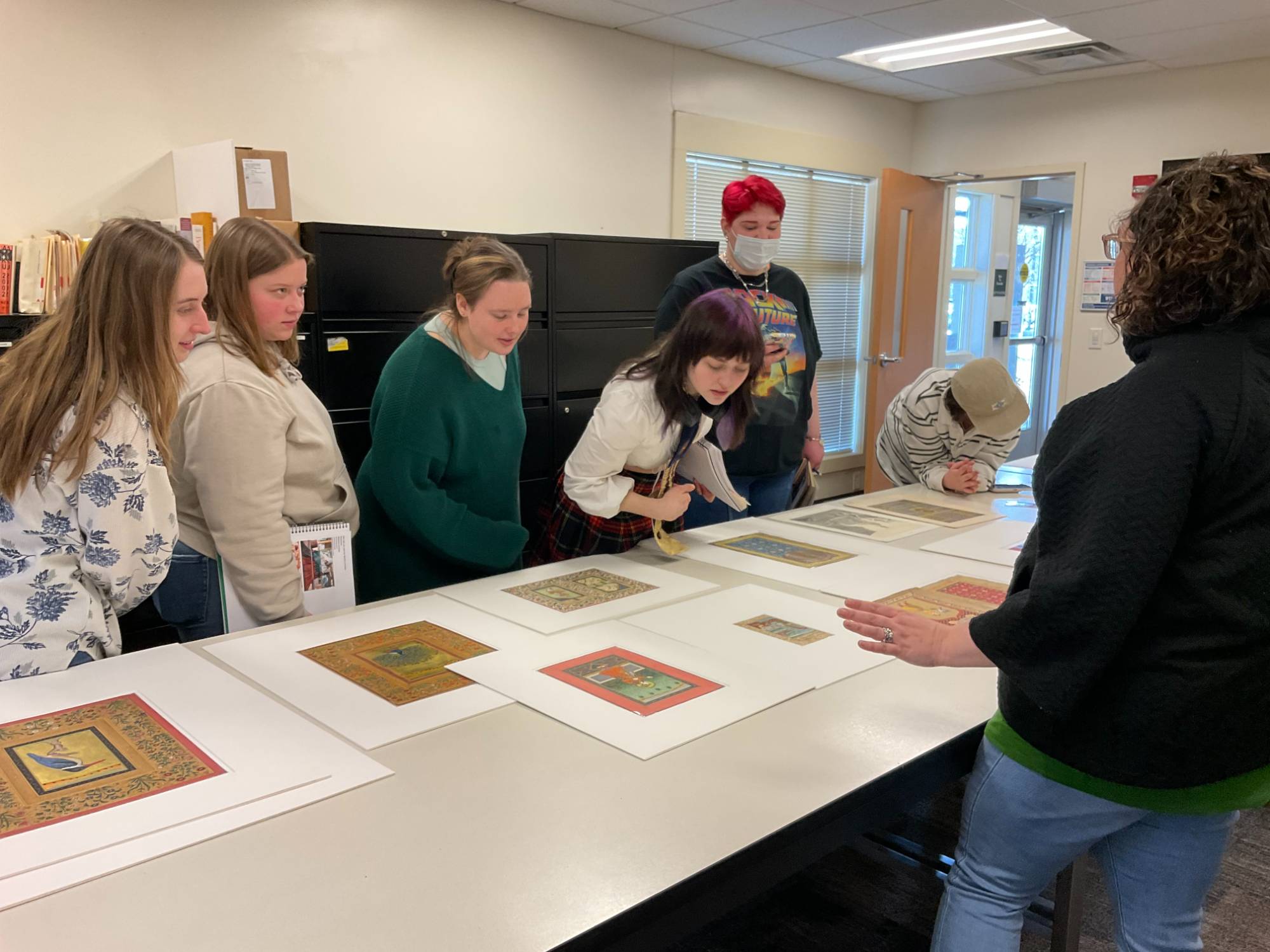 students viewing art in the classroom